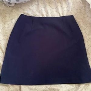 The limited stretch navy blue skirt